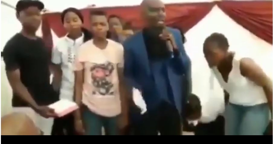African Pastor Tears Bible, Feed To Congregation