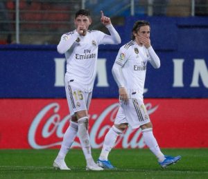 Real Madrid players jubilating a goal