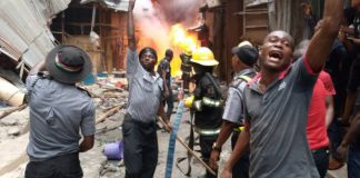 Lagos state fire service battling the fire at Balogun Market