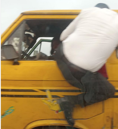 The man while fighting with the danfo driver
