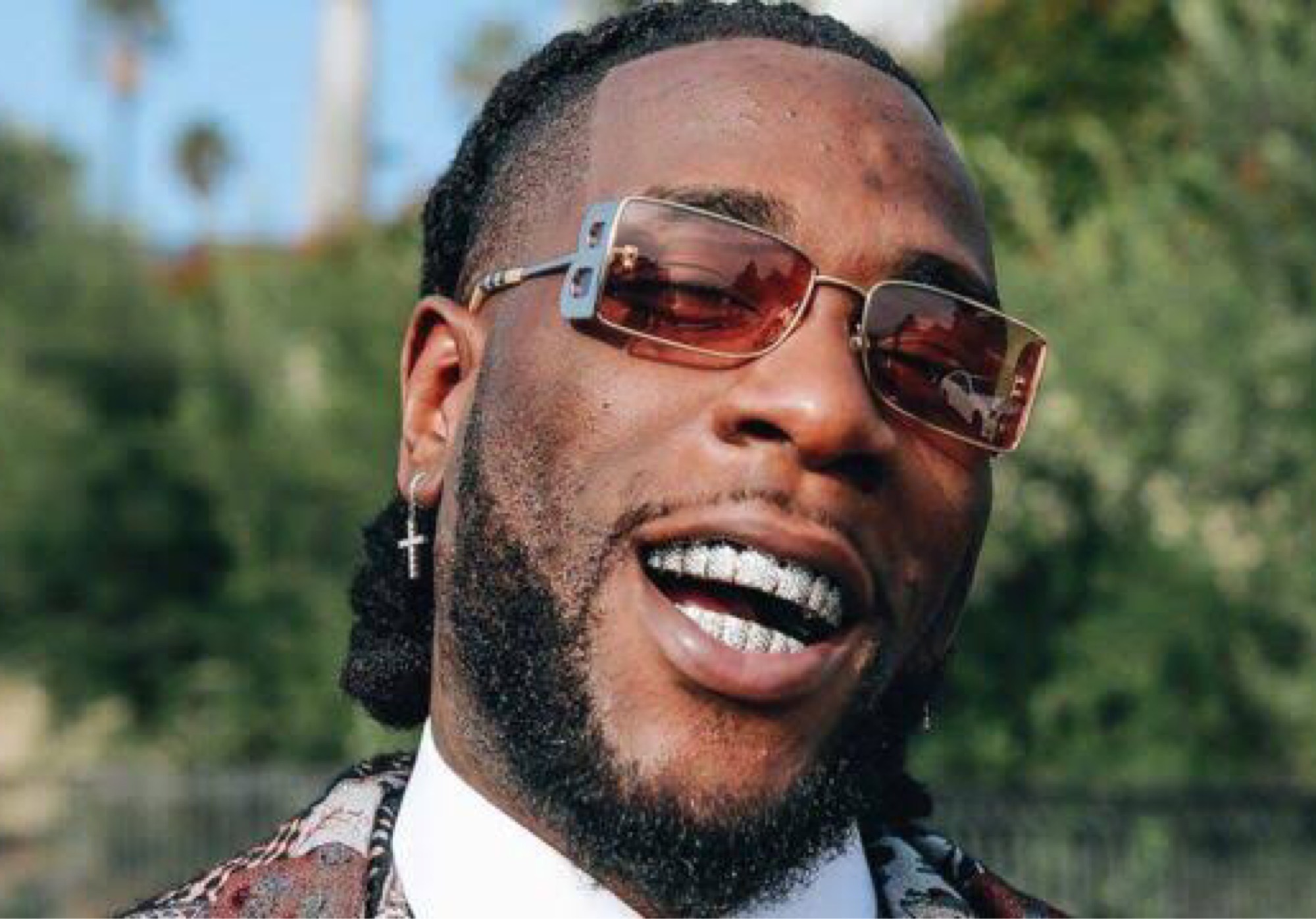 Burna Boy Apologizes After Being Called Over Reckless Tweets