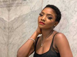Singer Simi reacts to artwork made for her by a fan