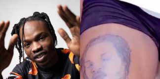 Singer Naira Marley Left Speechless After Die-Hard Fan Inked His Face On Her Skin