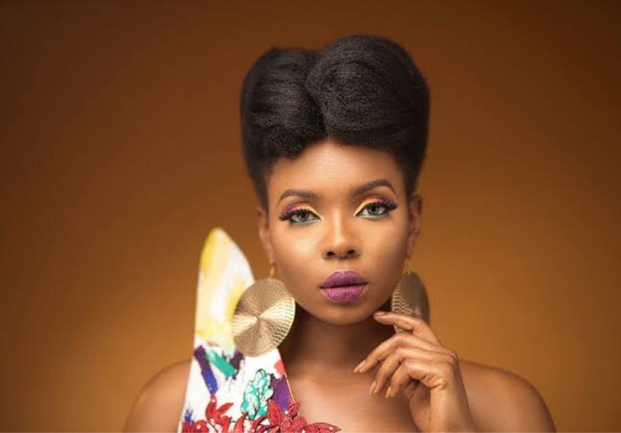 Yemi Alade Clashes With Troll Over #OccupyLekkiTollagte Protest