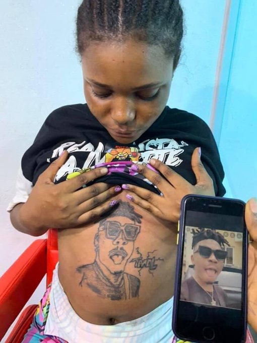 Pregnant Lady Tattoos Mayorkun's Face On Her Stomach - Information Nigeria