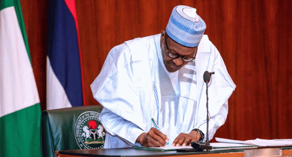 BREAKING: Finally, Buhari Signs Electoral Bill Into Law 